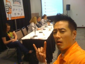 Larry Chiang takes a selfie while installing a female audience member to the VC panel