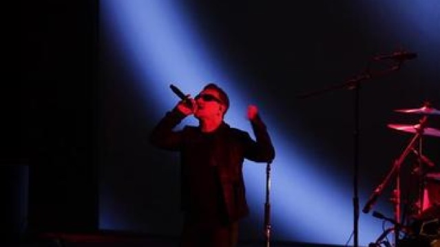 Bono singing in Cupertino